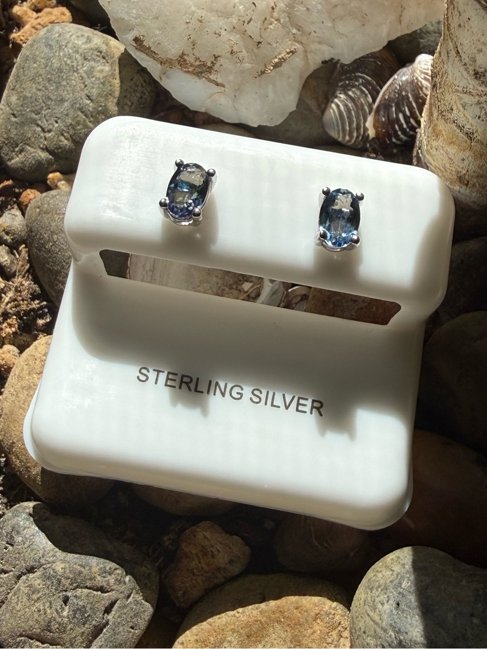 Sterling Silver Genuine Blue Topaz Oval Stud Earrings